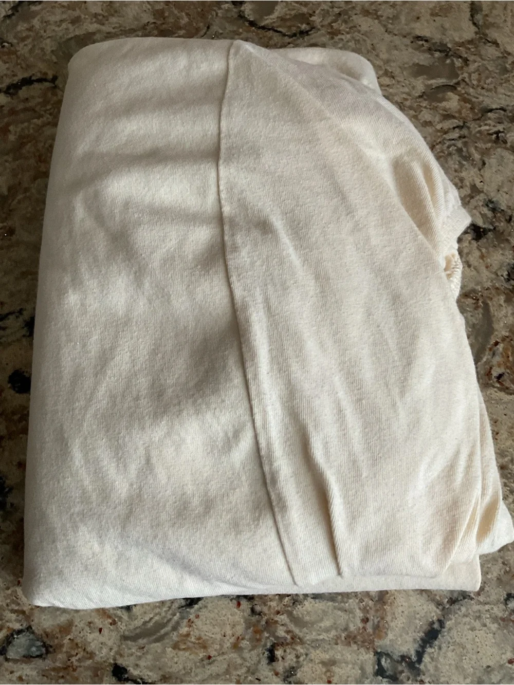 Organic cotton waterproof crib mattress protector by Naturepedic